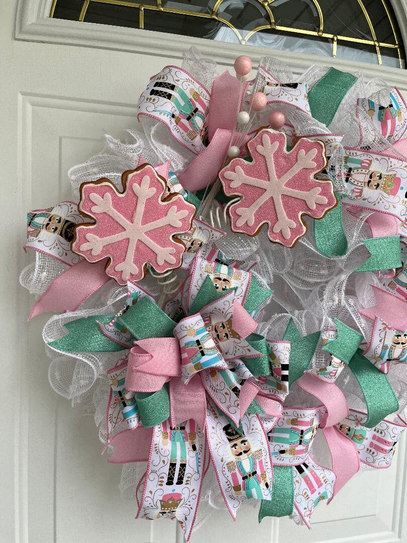 Snowflake Christmas Wreath, pink, turqoise, white wreath, bow with nutcracker soldier