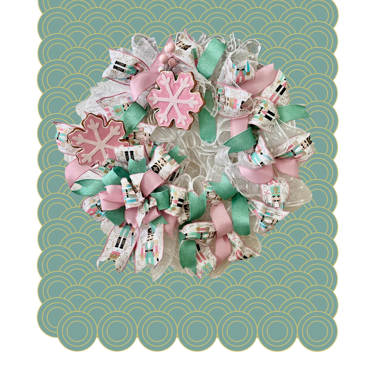 Snowflake Christmas Wreath, pink, turqoise, white wreath, bow with nutcracker soldier