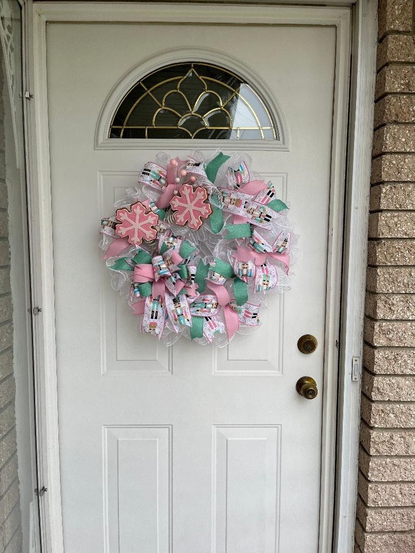 Snowflake Christmas Wreath, pink, turqoise, white wreath, bow with nutcracker soldier