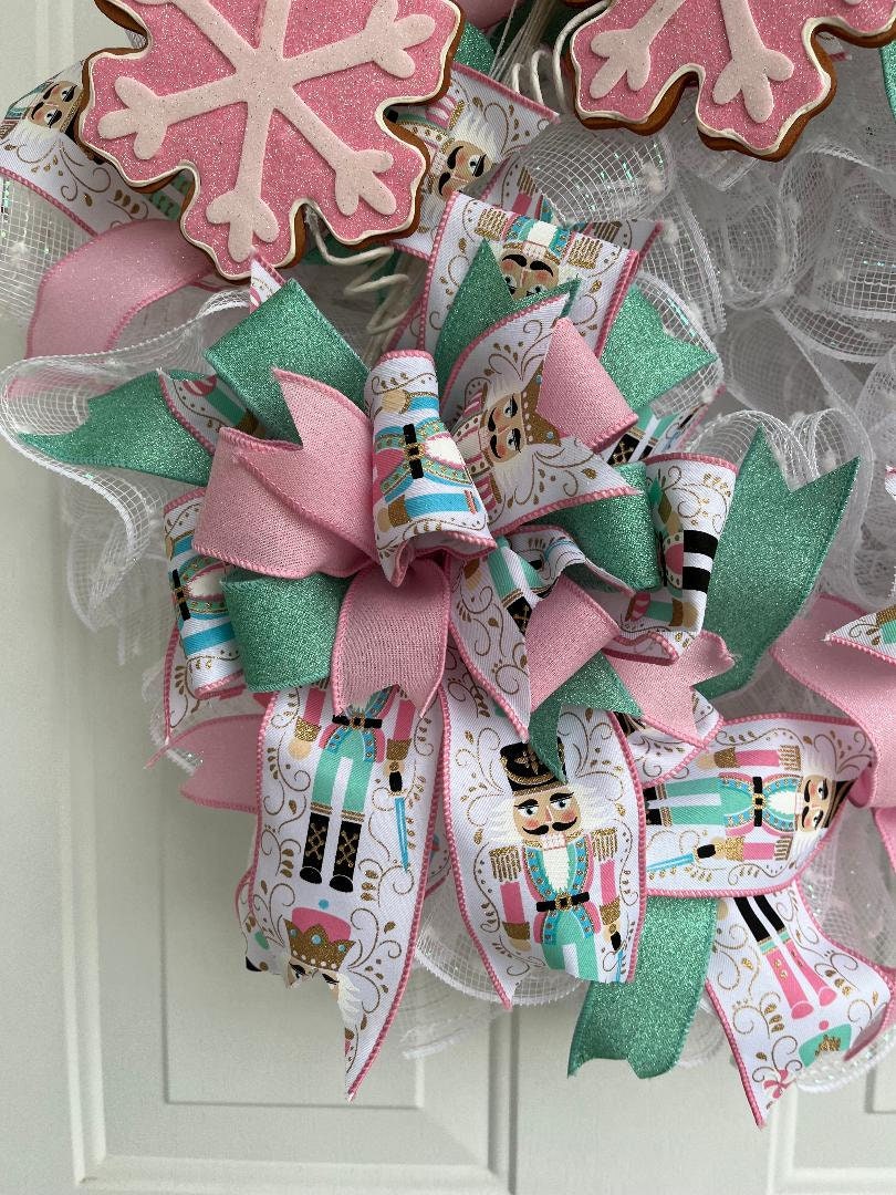 Snowflake Christmas Wreath, pink, turqoise, white wreath, bow with nutcracker soldier